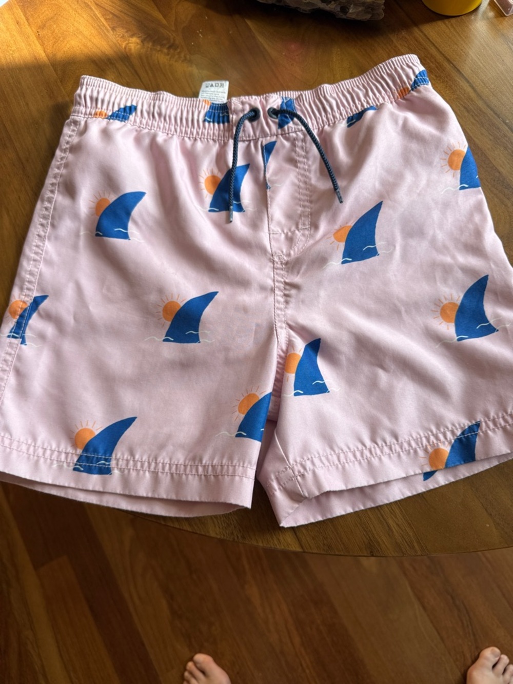 Tea Collection Pink Swim Trunks with Blue Shark Fin & Orange Sun Print
